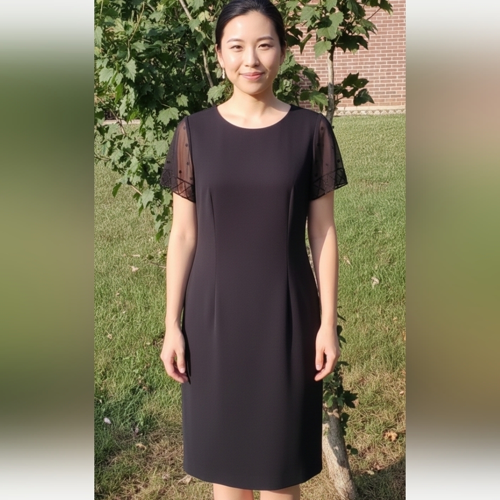 AGB black dress size 10 lacy beeded sleeve